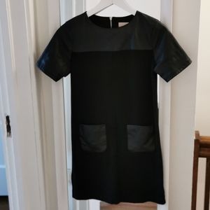 Black dress with faux leather details